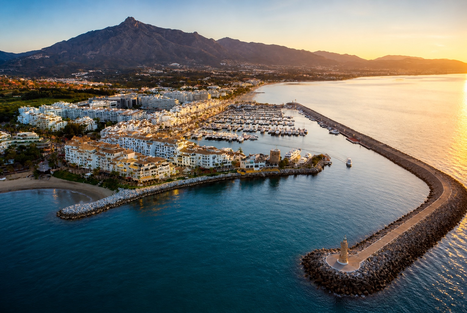 Marbella harbor at sunset